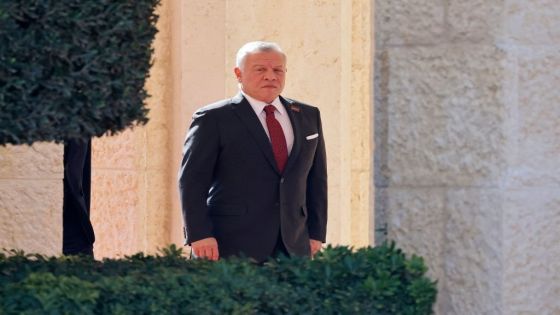 King Abdullah II of Jordan waits for France's President during the offical welcome ceremony at the royal Al-Husseiniya Palace in Amman on December 21, 2022, as Jordan hosts a Middle East summit, bringing together regional and international players hoping to help resolve regional crises, particularly in neighbouring Iraq. - The "Baghdad II" meeting, which also includes officials from France and the European Union, follows an August 2021 summit in Iraq's capital organised at the initiative of French President Emmanuel Macron. (Photo by Ludovic MARIN / POOL / AFP) (Photo by LUDOVIC MARIN/POOL/AFP via Getty Images)