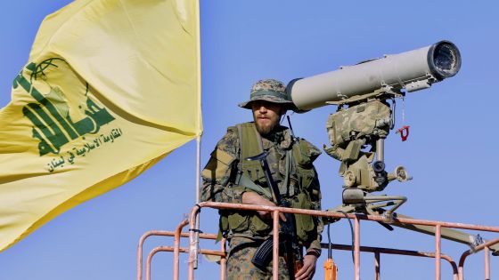 This Saturday, July 29, 2017 photo, a Hezbollah fighter stands at a watchtower at the site where clashes erupted between Hezbollah and al-Qaida-linked fighters in Wadi al-Kheil or al-Kheil Valley in the Lebanon-Syria border. When President Trump praised the Lebanese government for fighting Hezbollah last week, the Iranian-backed group was busy demonstrating just how wrong he was, clearing the country's eastern frontier from al-Qaida and negotiating a complex prisoners swap with the militant group alongside the Lebanese government. (AP Photo/Bilal Hussein)