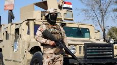 أمريكا تجمد برامج تعاون أمني وتوقف شحنات الدولار للعراق