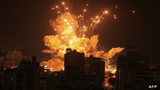 A missile explodes in Gaza City during an Israeli air strike on October 8, 2023. srael, reeling from the deadliest attack on its territory in half a century, formally declared war on Hamas Sunday as the conflict's death toll surged close to 1,000 after the Palestinian militant group launched a massive surprise assault from Gaza. (Photo by MAHMUD HAMS / AFP)