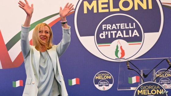 Leader of Italian far-right party "Fratelli d'Italia" (Brothers of Italy), Giorgia Meloni acknowledges the audience after she delivered an address at her party's campaign headquarters overnight on September 26, 2022 in Rome, after the country voted in a legislative election. - Far-right leader Giorgia Meloni won big in Italian elections on September 25, the first projections suggested, putting her eurosceptic populists on course to take power at the heart of Europe. (Photo by Andreas SOLARO / AFP)