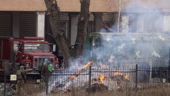 KYIV, UKRAINE - FEBRUARY 24: Military personnel throw items into a fire outside an intelligence building on February 24, 2022 in Kyiv, Ukraine. Overnight, Russia began a large-scale attack on Ukraine, with explosions reported in multiple cities and far outside the restive eastern regions held by Russian-backed rebels. (Photo by Chris McGrath/Getty Images)