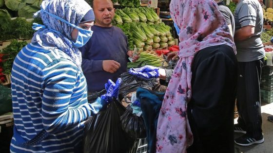 Women buy fresh vegetables at a market ahead of the Muslim holy month of Ramadan, during the novel coronavirus pandemic crisis in the Jordanian capital Amman, on April 23, 2020. (Photo by Khalil MAZRAAWI / AFP) (Photo by KHALIL MAZRAAWI/AFP via Getty Images)