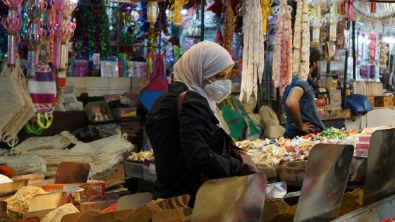 People shop at the Shorja market in central Baghdad ahead of the Muslim Eid al-Adha holiday amid the COVID-19 pandemic, on July 28, 2020. (Photo by SABAH ARAR / AFP) (Photo by SABAH ARAR/AFP via Getty Images)