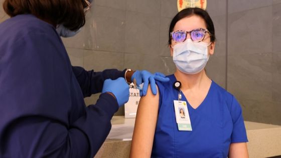 ER case manager Myaha Tovar, 24, is given the coronavirus disease (COVID-19) vaccine at Martin Luther King Jr. Community Hospital, in South Los Angeles, California, U.S., December 17, 2020. REUTERS/Lucy Nicholson