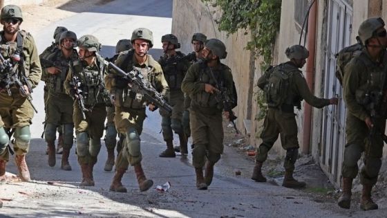 Israeli security forces search for suspects in the village of Salem, east of Nablus, on October 2, 2022, following a reported shooting attack at Israeli vehicles near the settlement of Allon Moreh in the occupied West Bank. (Photo by JAAFAR ASHTIYEH / AFP) (Photo by JAAFAR ASHTIYEH/AFP via Getty Images)