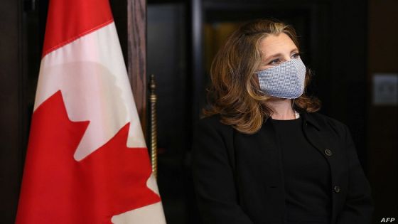 Canada's Deputy Prime Minister/Finance Minister Chrystia Freeland wears a facemask during a news conference on Parliament Hill August 18, 2020 in Ottawa, Canada. - Prime Minister Justin Trudeau tapped Chrystia Freeland to be Canada's first female finance minister on Tuesday as an ethics scandal that clipped her predecessor's wings reverberates through the government. Freeland received a standing ovation after being sworn in at a small ceremony at Rideau Hall, the official residence of Governor General Julie Payette in Ottawa. (Photo by Dave Chan / AFP)