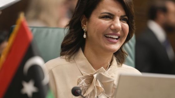 Libyan Foreign Minister Najla Mangoush smiles as she chairs the Arab League foreign ministers annual meeting in Cairo, Egypt, Tuesday, Sept. 6, 2022. (AP Photo/Amr Nabil)