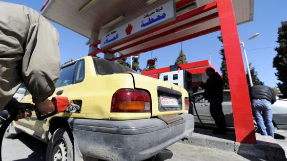 A man fills the tank of a car at a petrol station in Damascus, Syria , February 19, 2017. Picture taken February 19, 2017. REUTERS/Omar Sanadiki