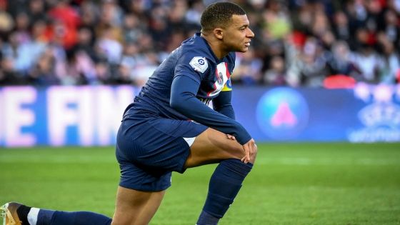 Paris Saint-Germain's French forward Kylian Mbappe reacts during the French L1 football match between Paris Saint-Germain (PSG) and Stade Rennais FC at The Parc des Princes Stadium in Paris on March 19, 2023. (Photo by FRANCK FIFE / AFP)