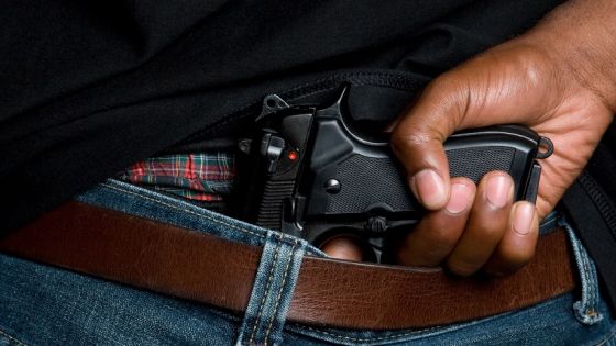 Black man with concealed weapon