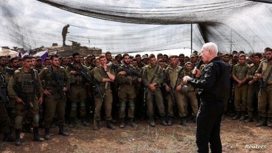 Israel's Defence Minister Yoav Gallant meets soldiers in a field near Israel's border with the Gaza Strip, in southern Israel October 19, 2023. REUTERS/Ronen Zvulun TPX IMAGES OF THE DAY