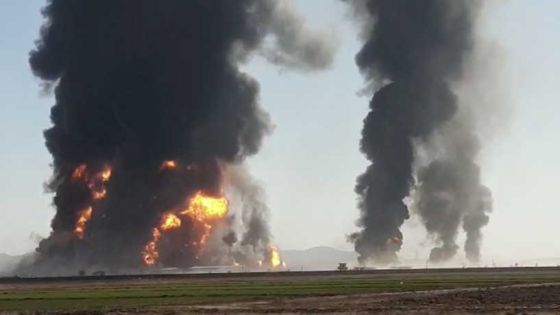 Fire and smoke rise from an explosion of a gas tanker in Herat, Afghanistan February 13, 2021 in this picture obtained by Reuters from a video. ATTENTION EDITORS - THIS IMAGE HAS BEEN SUPPLIED BY A THIRD PARTY.