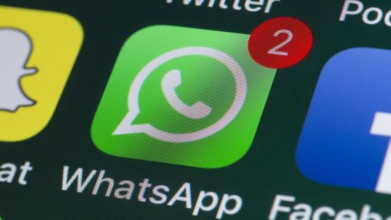 London, UK - July 31, 2018: The buttons of WhatsApp, Facebook, Twitter and other apps on the screen of an iPhone.