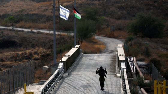An Israeli soldier patrols the border area between Israel and Jordan at Naharayim, as seen from the Israeli side October 22, 2018. REUTERS/ Ronen Zvulun