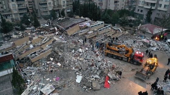 KAHRAMANMARAS, TURKIYE - FEBRUARY 06: An aerial view shows search and rescue operations continue at collapsed 15 storey building after 7.7 and 7.6 magnitude earthquakes hit Turkiye's Kahramanmaras, on February 06, 2023. Disaster and Emergency Management Authority (AFAD) of Turkiye said the 7.7 magnitude quake struck at 4.17 a.m. (0117GMT) and was centered in the Pazarcik district and 7.6 magnitude quake struck in Elbistan district in the province of Kahramanmaras in the south of Turkiye. Gaziantep, Sanliurfa, Diyarbakir, Adana, Adiyaman, Malatya, Osmaniye, Hatay, and Kilis provinces are heavily affected by the earthquakes. (Photo by Halife Yalcinkaya/Anadolu Agency via Getty Images)