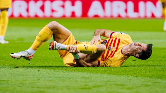 PORTO, PORTUGAL - OCTOBER 04: Robert Lewandowski of FC Barcelona lies injured on the field during the UEFA Champions League Group H match between FC Porto and FC Barcelona at the Estadio Do Dragao on October 4, 2023 in Porto, Portugal. (Photo by DAX Images/BSR Agency/Getty Images)