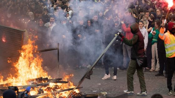 Protesters burn fences during a demonstration on Place de la Concorde after the French government pushed a pensions reform through parliament without a vote, using the article 49,3 of the constitution, in Paris on March 16, 2023. The French president on March 16 rammed a controversial pension reform through parliament without a vote, deploying a rarely used constitutional power that risks inflaming protests. The move was an admission that his government lacked a majority in the National Assembly to pass the legislation to raise the retirement age from 62 to 64. Photo by Raphael Lafargue/ABACAPRESS.COM