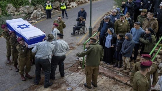 Israeli soldiers carry the flag-draped casket of Sergeant Binyamin Meir Airly, during his funeral in Mt. Herzl military cemetery in Jerusalem, Sunday, Nov. 19, 2023. Airly was killed during a military ground operation in the Gaza Strip. (AP Photo/Ohad Zwigenberg)