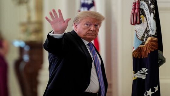 U.S. President Donald Trump waves as he departs following a meeting of the American Workforce Policy Advisory Board in the East Room at the White House in Washington, U.S., June 26, 2020. REUTERS/Tom Brenner