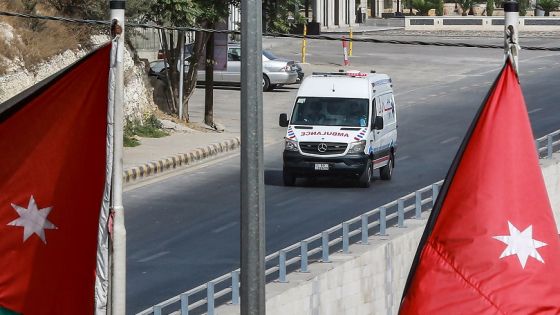 An ambulance drives along an empty road during a COVID-19 coronavirus lockdown in Jordan's capital Amman on October 9, 2020. (Photo by Khalil MAZRAAWI / AFP) (Photo by KHALIL MAZRAAWI/afp/AFP via Getty Images)