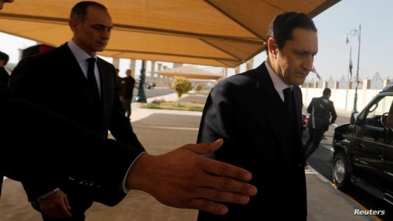 Alaa and Gamal, sons of former Egyptian President Hosni Mubarak, walk during the funeral of their father east of Cairo, Egypt February 26, 2020. REUTERS/Amr Abdallah Dalsh