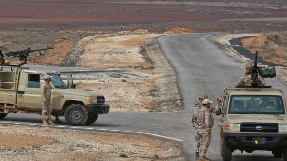 A picture taken during a tour origanized by the Jordanian Army shows soldiers patrolling along the border with Syria to prevent trafficking, on February 17, 2022. - Drug trafficking from Syria into Jordan is becoming "organised" with smugglers stepping up operations and using sophisticated equipment including drones, Jordan's army said, warning of a shoot-to-kill policy. Since the beginning of this year, Jordan's army has killed 30 smugglers and foiled attempts to smuggle into the kingdom from Syria 16 million Captagon pills -- more than they seized in the whole of 2021 -- the military said. (Photo by Khalil MAZRAAWI / AFP) (Photo by KHALIL MAZRAAWI/afp/AFP via Getty Images)