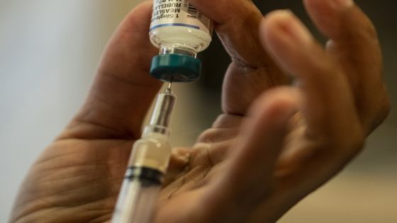 This picture taken on April 5, 2019 shows a nurse preparing the measles, mumps and rubella vaccine at the Rockland County Health Department in Haverstraw, Rockland County, New York. - A measles outbreak in the area has sickened scores of people and caused the county to bar unvaccinated minors in public places. (Photo by Johannes EISELE / AFP) / With AFP Story by Catherine TRIOMPHE: NY county measles outbreak spotlights vaccine religious exemptions