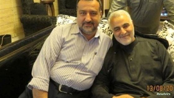 Senior adviser for Iran's Islamic Revolutionary Guard Corps, Sayyed Razi Mousavi, sits next to late Iranian Major-General Qasem Soleimani in an unknown location, in this handout image obtained on December 25, 2023. Tasnim News/WANA (West Asia News Agency)/Handout via REUTERS ATTENTION EDITORS - THIS PICTURE WAS PROVIDED BY A THIRD PARTY.