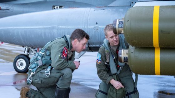 U.S. Air Force's Nathan Paige and Andrew "Chaos" Davis from the Colorado Air National Guard do a final inspect of a cluster bomb at Hill Air Force Base, Utah, U.S., on January 10, 2023. U.S. Air National Guard/Tech Sgt. Chance Johnson/Handout via REUTERS THIS IMAGE HAS BEEN SUPPLIED BY A THIRD PARTY.