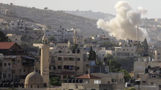 A photo taken from the city of Jenin, in the occupied West Bank on November 9, 2023, shows smoke rising from the Jenin Palestinian refugee camp during clashes with the Israeli military and Palestinians. - Six Palestinians were killed on November 9, during an Israeli raid on Jenin in the north of the occupied West Bank, the Palestinian health ministry said, updating an earlier toll. Since the beginning of the war triggered by attacks on October 7 by Gaza-based Hamas militants, which Israeli officials say killed more than 1,400 people, more than 150 Palestinians have been killed in clashes with Israeli forces in the West Bank, according to the Palestinian health ministry. (Photo by Zain JAAFAR / AFP)