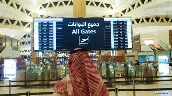 A Saudi man checks the flight timings at the King Khalid International Airport, after Saudi authorities lifted the travel ban on its citizens after fourteen months due to coronavirus disease (COVID-19) restrictions, in Riyadh, Saudi Arabia, May 16, 2021. REUTERS/Ahmed Yosri