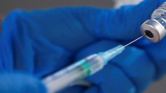 FILE PHOTO: A nurse fills a syringe with a second dose of the Pfizer-BioNTech COVID-19 vaccine, as the coronavirus disease (COVID-19) outbreak continues, at Enfermera Isabel Zendal new pandemic hospital in Madrid, Spain, February 4, 2021. REUTERS/Sergio Perez/File Photo