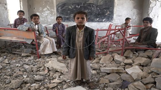 AAL OKAB SCHOOL ,SAADA CITY, YEMEN - 24 APRIL 2017: Young students stand in the ruins of a former classroom of the Aal Okab school. Located in the outskirts of Saada City, the school was destroyed in June 2015. Students now attend lessons in UNICEF tents nearby. Some 2 million school-age children are currently out of school in Yemen today. (Photo by Giles Clarke, UN OCHA / Getty Images)