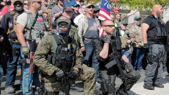 Armed demonstrators attend a '2nd Amendment' rally outside the Michigan Supreme Court Building in Lansing, Michigan, U.S. September 17, 2020. REUTERS/Rebecca Cook