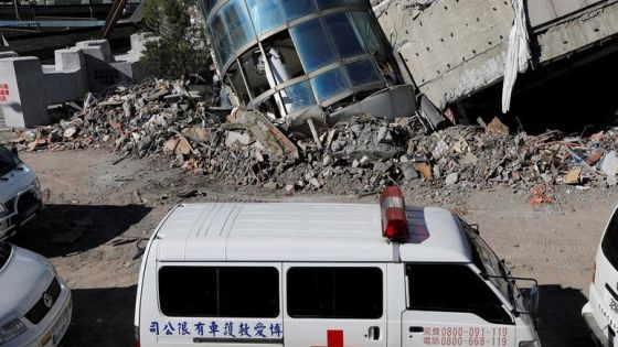 Ambulances park outside a collapses building after an earthquake hit Hualien, Taiwan February 10, 2018. REUTERS/Tyrone Siu