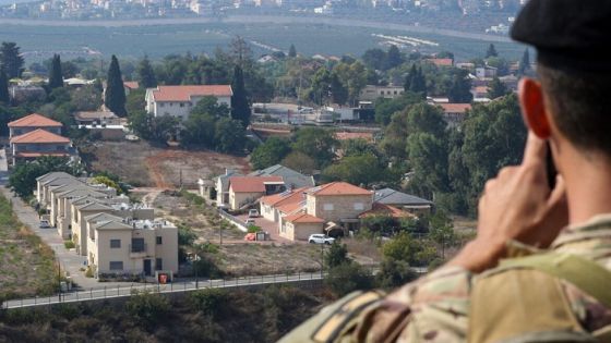 A Lebanese soldier monitors the border area with the northern Israeli town of Metula on October 8, 2023, after Lebanon's Hezbollah and Israel said they traded cross-border fire. - Hezbollah said it carried out Sunday's assault "in solidarity" with a large-scale air, sea and land attack Hamas launched the day before against Israel, in a dramatic escalation of the Israel-Palestinian conflict. (Photo by Mahmoud ZAYYAT / AFP)