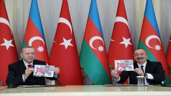 Presidents Tayyip Erdogan of Turkey and Ilham Aliyev of Azerbaijan attend a signing ceremony in Baku, Azerbaijan December 10, 2020. Murat Cetinmuhurdar/Turkish Presidential Press Office/Handout via REUTERS ATTENTION EDITORS - THIS PICTURE WAS PROVIDED BY A THIRD PARTY. NO RESALES. NO ARCHIVE.