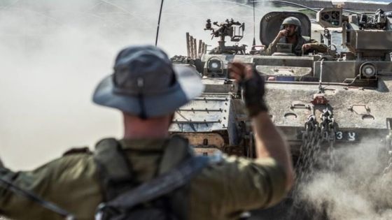 14 October 2023, Israel, Sderot: Israeli military combat vehicles and tanks are seen near the Israeli-Gaza border as fighting between Israeli troops and the militants of the Palestinian group Hamas continues. Photo: Ilia Yefimovich/dpa