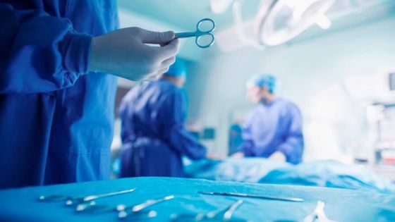 Doctors performing surgery in hospital operating room