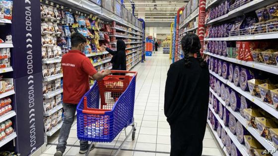 A woman shops for snacks at a supermarket in Saudi Arabia's capital Riyadh on October 18, 2020. - Following a call by the head of the Saudi chamber of commerce Ajlan al-Ajlan to "boycott everything Turkish", multiple supermarket chains in the kingdom announced they were stopping the import and sale of Turkish products from pickled vine leaves to coffee and cream cheese, as rivalry between Riyadh and Ankara heats up. Turkey and Saudi Arabia have long competed for supremacy in the Muslim world, but their geopolitical rivalry has intensified after journalist Jamal Khashoggi's 2018 murder by Saudi agents at the kingdom's Istanbul consulate. (Photo by FAYEZ NURELDINE / AFP)
