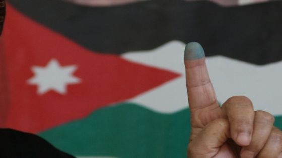 A Jordanian woman shows her ink-stained finger after casting her ballot in the parliamentary elections at a polling station in the capital Amman on September 20, 2016. Jordanians are voting in an election that could see opposition Islamists re-emerge as a major parliamentary force in the key Western ally. / AFP / Khalil MAZRAAWI (Photo credit should read KHALIL MAZRAAWI/AFP/Getty Images)