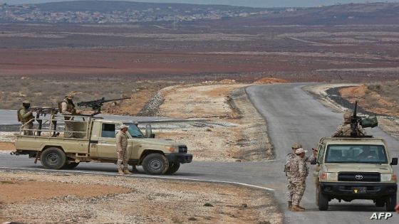 A picture taken during a tour origanized by the Jordanian Army shows soldiers patrolling along the border with Syria to prevent trafficking, on February 17, 2022. - Drug trafficking from Syria into Jordan is becoming "organised" with smugglers stepping up operations and using sophisticated equipment including drones, Jordan's army said, warning of a shoot-to-kill policy. Since the beginning of this year, Jordan's army has killed 30 smugglers and foiled attempts to smuggle into the kingdom from Syria 16 million Captagon pills -- more than they seized in the whole of 2021 -- the military said. (Photo by Khalil MAZRAAWI / AFP)