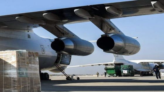 Humanitarian aid relief packages provided by Saudi Arabia for victims of the Febraury 6 earthquake are unloaded off of an Ilyushin Il-76TD transport aircraft at Aleppo International Airport in northern Syria on February 14, 2023. The plane carrying aid to quake-hit Syria landed in second city Aleppo on February 14 -- the first from Saudi Arabia in more than a decade of war, according to a transport ministry official. Planeloads of foreign aid have landed in Syria since a 7.8-magnitude quake struck the war-torn country and neighbouring Turkey killing more than 35,000 people. (Photo by AFP)