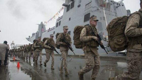 130504-N-DR144-818 ANCHORAGE, Alaska (May 4, 2013) Marines assigned to Task Force Denali run to bring the ship to life during the commissioning of the San Antonio-class amphibious transport dock ship USS Anchorage (LPD 23) at the Port of Anchorage. More than 4,000 people gathered to witness the ship's commissioning in its namesake city of Anchorage, Alaska. Anchorage, the seventh San Antonio-class LPD, is the second ship to be named for the city and the first U.S. Navy ship to be commissioned in Alaska. (U.S. Navy photo by Mass Communication Specialist 1st Class James R. Evans/Released)