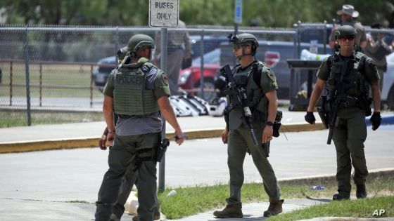 Law enforcement personnel stand outside Robb Elementary School following a shooting, Tuesday, May 24, 2022, in Uvalde, Texas. (AP Photo/Dario Lopez-Mills)