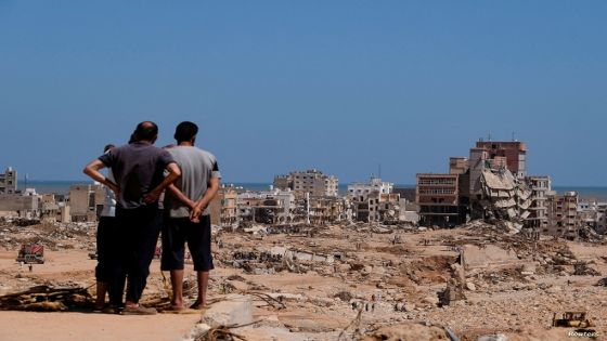 A view shows people looking at the damaged areas, in the aftermath of the floods in Derna, Libya September 14, 2023. REUTERS/Esam Omran Al-Fetori TPX IMAGES OF THE DAY