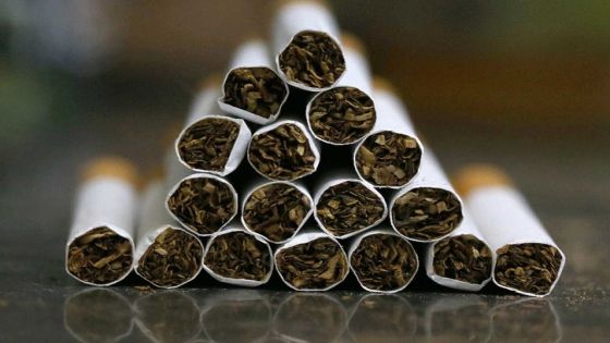 A picture taken on September 29, 2017 shows a close up shot a stack of cigarettes in Kuwait City. - On October 1, 2017, the United Arab Emirates will double the price of tobacco and increase soft drink prices by 50 percent, ahead of a more general tax on goods and services on January 1 next year. It is but one of the six Gulf Cooperation Council states -- along with Saudi Arabia, Bahrain, Kuwait, Oman and Qatar -- to introduce the five-percent VAT next year as they seek to redress their economies. (Photo by Yasser Al-Zayyat / AFP)