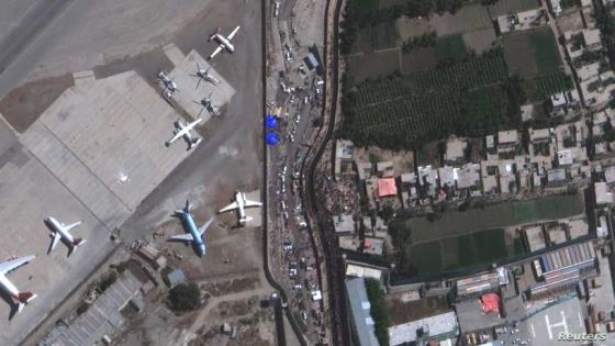 An overview of crowds at the Abbey Gate at Hamid Karzai International Airport, in Kabul, Afghanistan August 24, 2021, in this satellite image obtained by Reuters on August 26, 2021. Satellite image 2021 Maxar Technologies/Handout via REUTERS. ATTENTION EDITORS - THIS IMAGE HAS BEEN SUPPLIED BY A THIRD PARTY. MANDATORY CREDIT. NO RESALES. NO ARCHIVES. DO NOT OBSCURE LOGO.