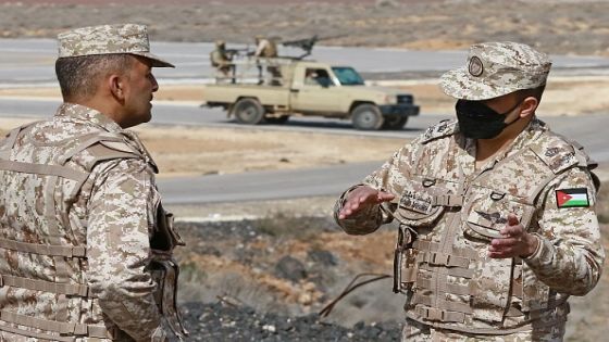 A picture taken during a tour origanized by the Jordanian Army shows soldiers patrolling along the border with Syria to prevent trafficking, on February 17, 2022. - Drug trafficking from Syria into Jordan is becoming "organised" with smugglers stepping up operations and using sophisticated equipment including drones, Jordan's army said, warning of a shoot-to-kill policy. Since the beginning of this year, Jordan's army has killed 30 smugglers and foiled attempts to smuggle into the kingdom from Syria 16 million Captagon pills -- more than they seized in the whole of 2021 -- the military said. (Photo by Khalil MAZRAAWI / AFP) (Photo by KHALIL MAZRAAWI/afp/AFP via Getty Images)